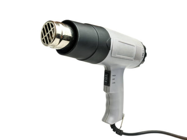 Electric heat gun isolated on white background